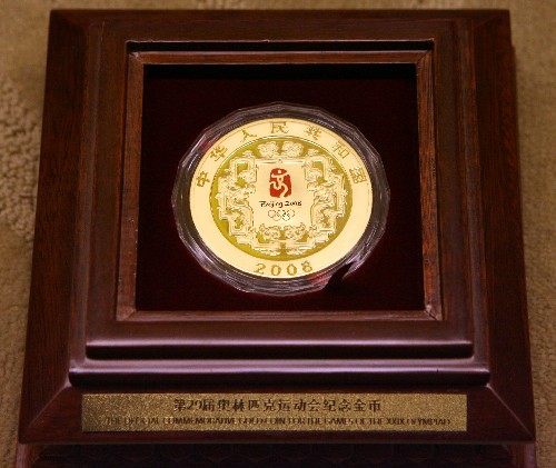 China unveils more Olympic coins