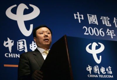 China Telecom Chairman & Chief Executive Wang Xiaochu speaks during a news conference announcing the company's 2006 annual results in Hong Kong March 26, 2007. 