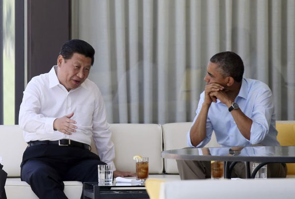 US President Barack Obama and Chinese President Xi Jinping talk at the Annenberg Retreat, California, June 8, 2013. Obama and Xi start talk with a walk