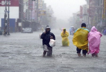 12 dead, 52 missing in Taiwan flooding: rescuers