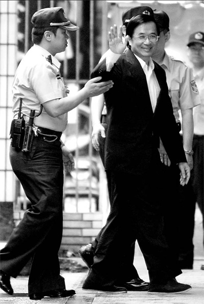 Former Taiwan leader's life sentence cut to 20 yrs