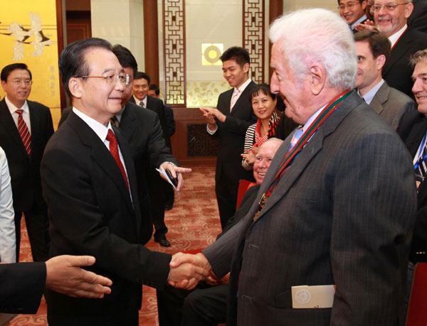 Premier promises more open policies for foreign talents