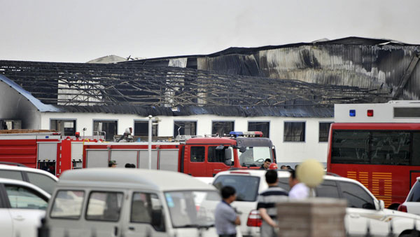 A poultry slaughterhouse was gutted by a fire in Dehui, Jilin province, on Monday. Wang Haofei / Xinhua Workshop fire kills at least 119