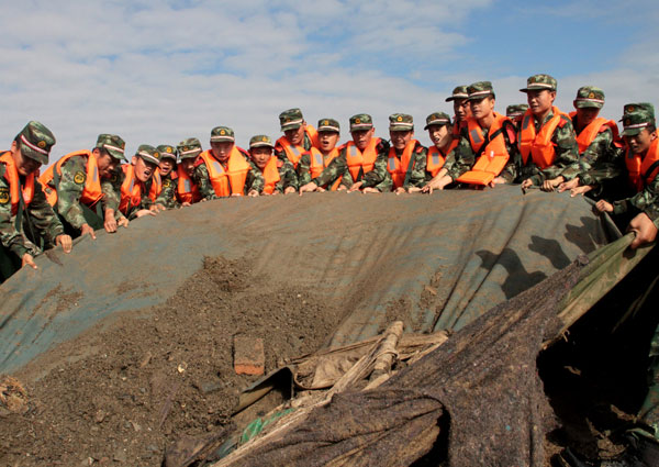21 dead in NW China rainstorm-triggered flood