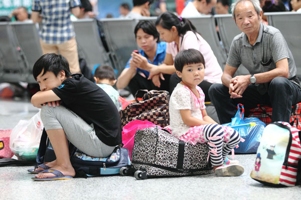 Heartbreaking partings for 'left-behind children'