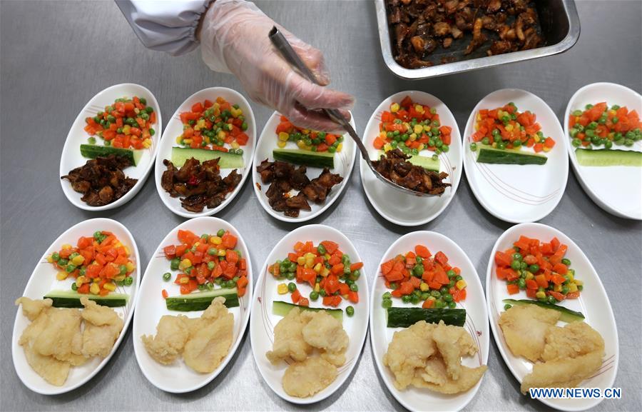 In-flight meal prepared for travel rush ahead of Spring Festival