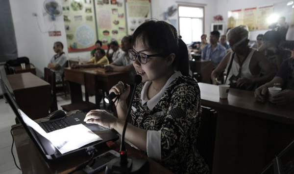 Wuhan amputee brings movies to life for the visually impaired