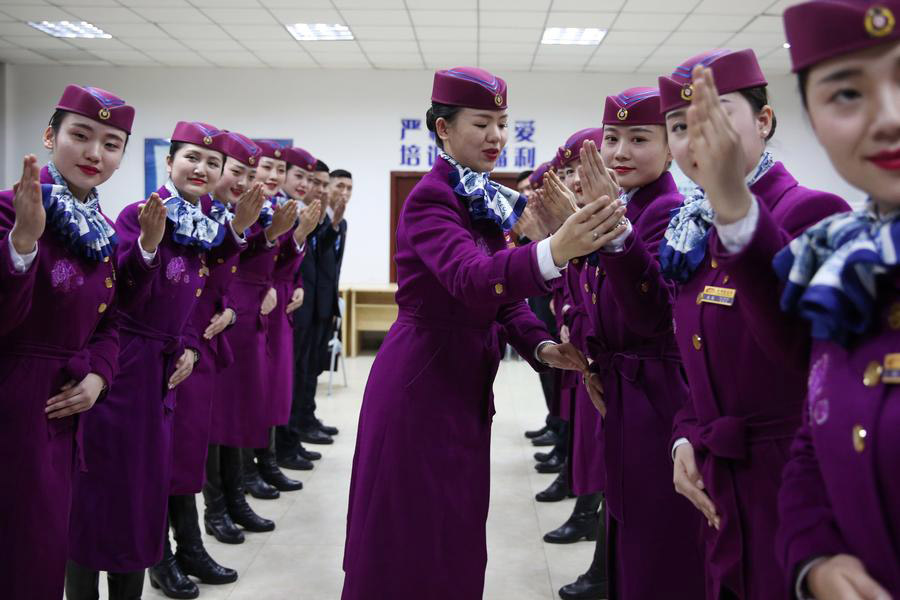 High-speed train stewardesses receive training in SW China