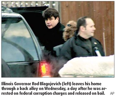 Illinois governor ignores Obama's call to resign