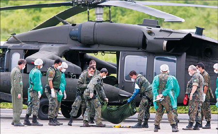 Jet crash victims' bodies flown to mainland