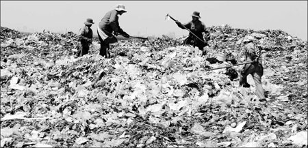 Trash hill casts shadow on village