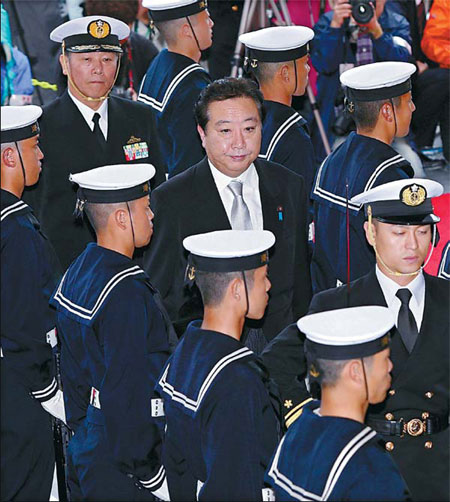 US official visits Tokyo as island questions linger