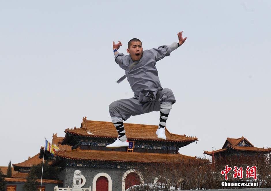 Monks practice Shaolin kung fu