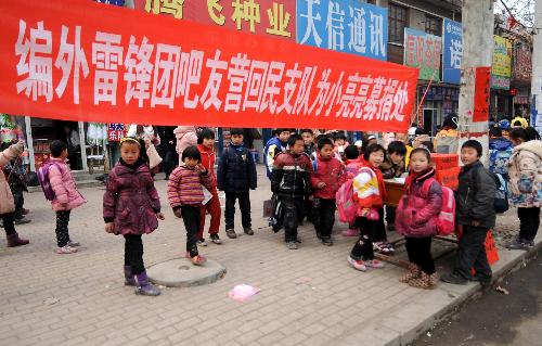 “編外雷鋒團(tuán)”:一座豫南小城的雷鋒印