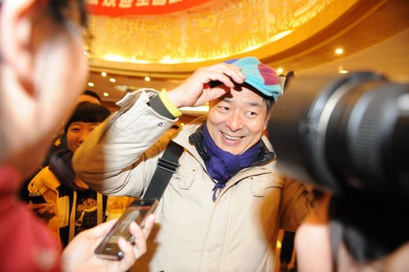 iPhone受寵!看看兩會記者的采訪工具