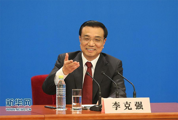 李克強：中國和平發展與維護主權兩條原則并行不悖
