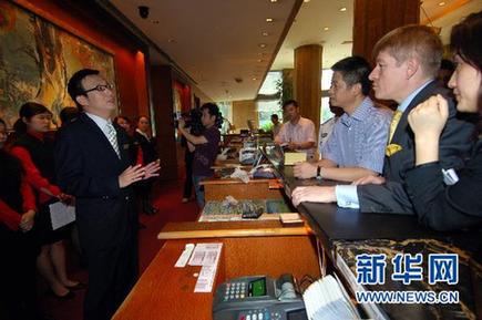 重慶警方同意希爾頓酒店29日起試營(yíng)業(yè)