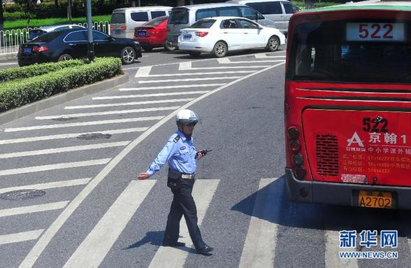 [人物寫真]“烈日下，我們堅守崗位”