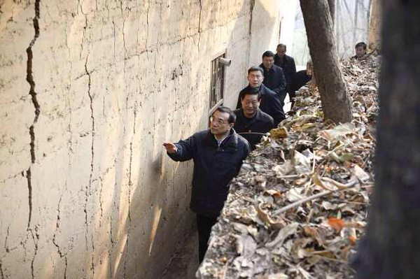 李克強與山村留守兒童父親通話囑平安