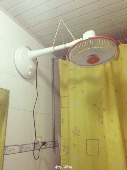 老爸為女抗嚴寒用取暖器自制浴霸 網(wǎng)友：高大上(圖)