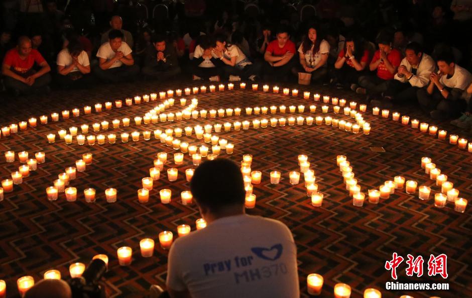 MH370航班失聯滿月 在京乘客家屬舉行祈福活動