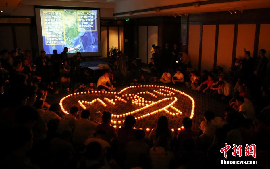 MH370航班失聯滿月 在京乘客家屬舉行祈福活動
