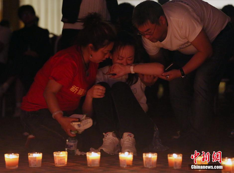 MH370航班失聯滿月 在京乘客家屬舉行祈福活動