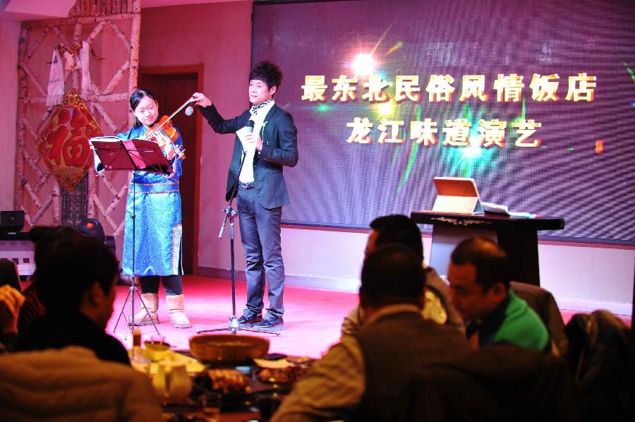 小提琴挑起家的重?fù)?dān)