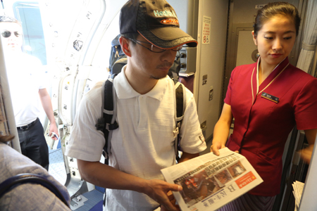 巴遇襲幸存者張京川今日乘南航班機返回昆明