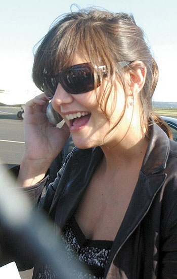 Tom Cruise puts Katie's parents on hold