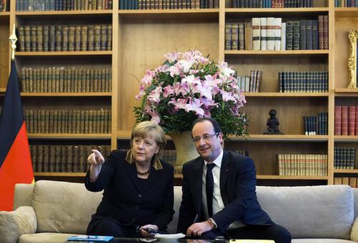 圖：德法兩國(guó)慶“金婚” 默克爾奧朗德“秀恩愛”