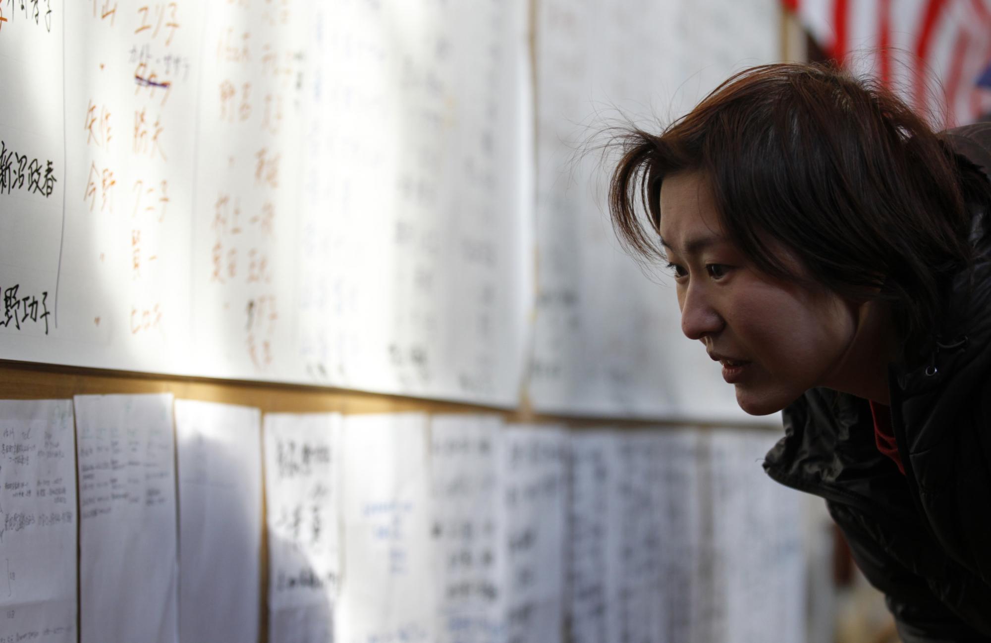組圖:日強震廢墟中的家庭合影 救援人員全力搜救