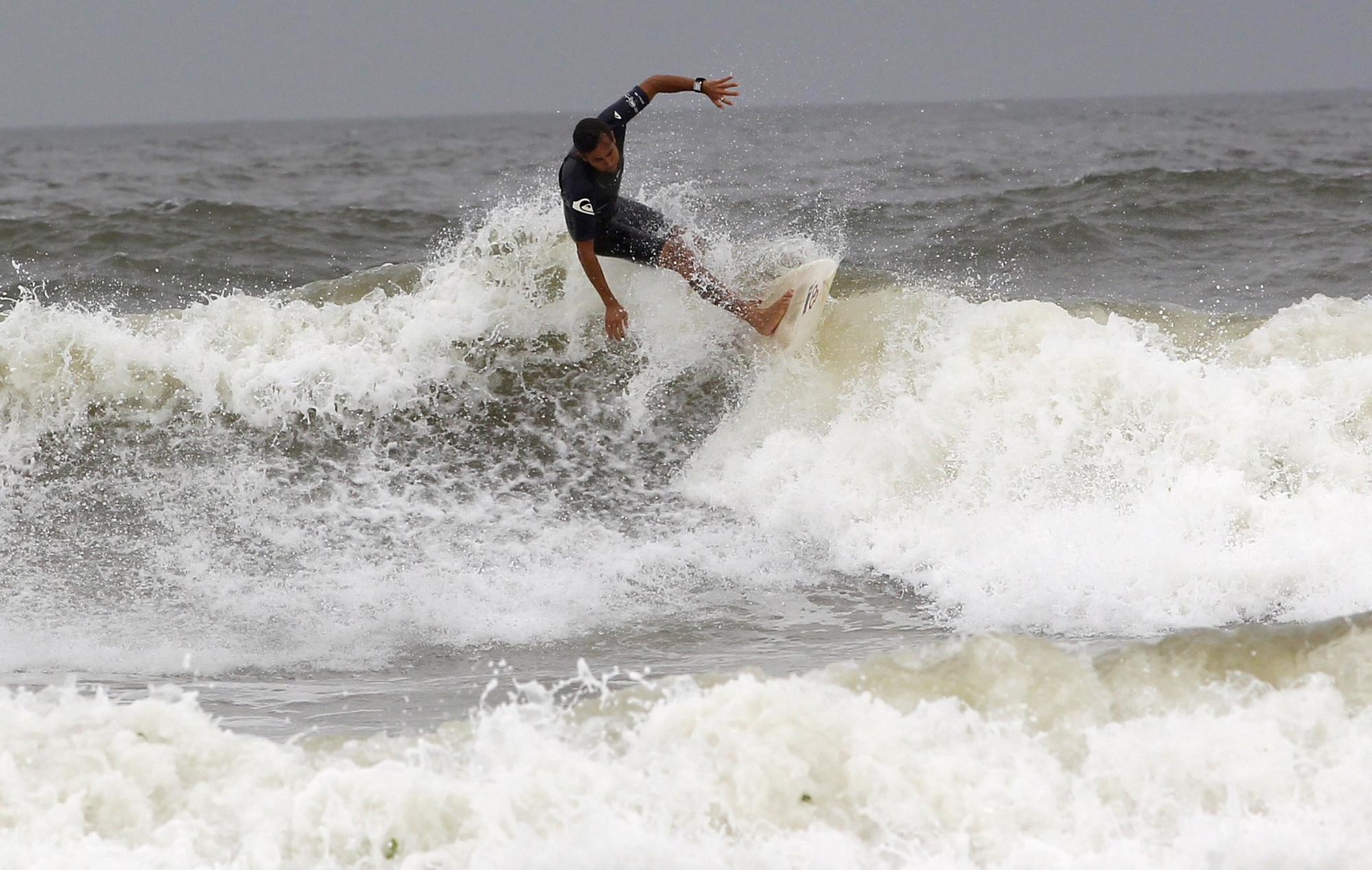 組圖：颶風(fēng)“艾琳”襲擊美國(guó)東海岸 民眾淡定應(yīng)對(duì)