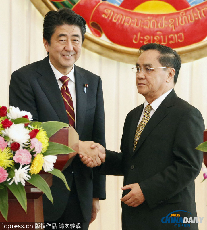 安倍晉三訪問老撾 以金援換支持“入常”（圖）