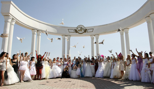 Parading brides: Married women experience wedding day again