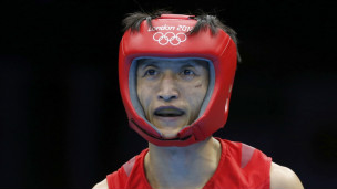 中國選手鄒市明衛冕成功獲拳擊金牌