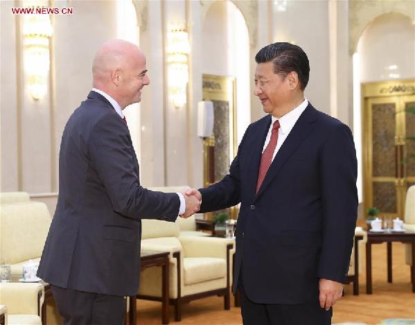 習近平會見國際足聯(lián)主席 談足球運動的真諦
