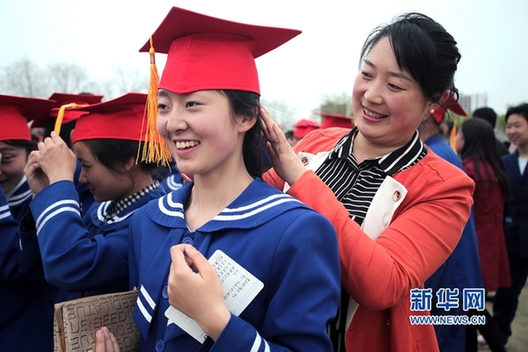 Gansu holds rites of initiation for middle school students