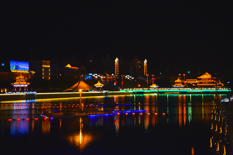 Vibrant night cityscape of Gansu's Dunhuang city