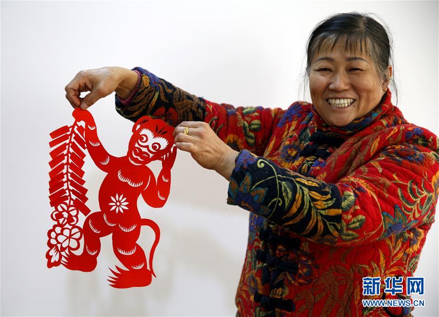 Paper-cut monkeys welcome Spring Festival