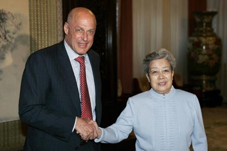 U.S. Treasury Secretary Henry Paulson (L) shakes hands with China's Vice Premier Wu Yi at Zhongnanhai in Beijing July 31, 2007.