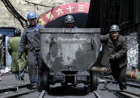 Rescuers race against time for trapped miners