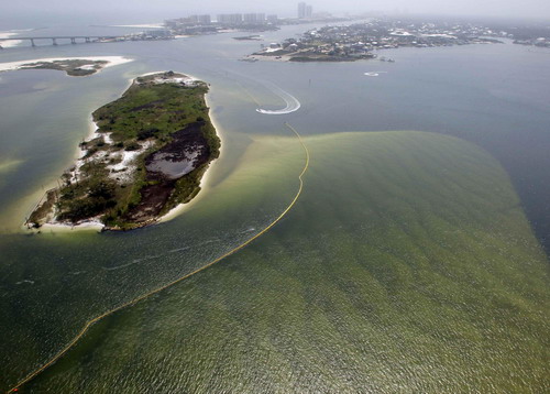 US shields coastline with oil containment boom
