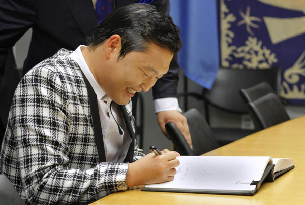 Ban practices 'Gangnam Style' dance steps with Psy