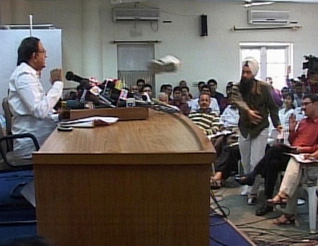 Indian minister targeted by copycat shoe thrower