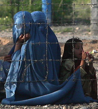 Displaced people at a repatriation centre in Pakistan
