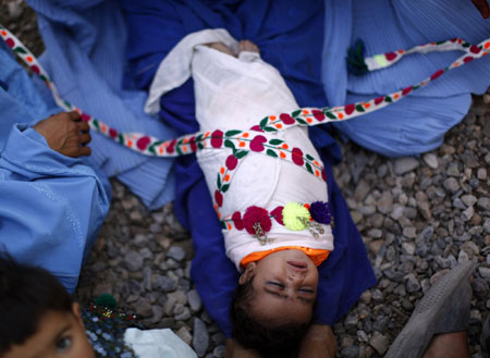 Displaced people at a repatriation centre in Pakistan