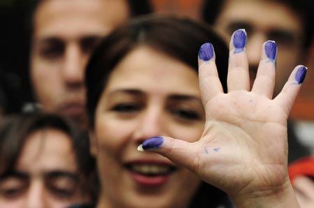 Iran's Ahmadinejad, rival both claim election win