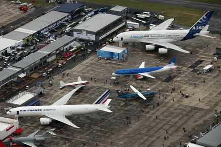 Rain glooms Paris Air Show