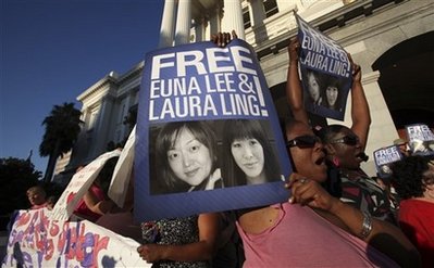 Report: 2 US journalists staying in guest house